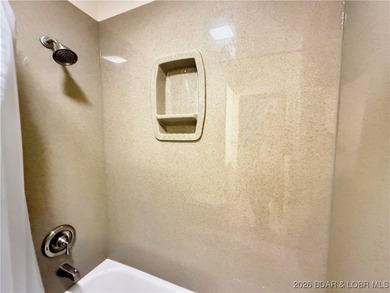Enjoy lake living at its best in this beautifully maintained - photo 24