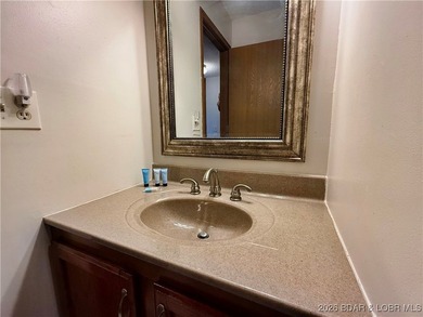 Enjoy lake living at its best in this beautifully maintained - photo 25