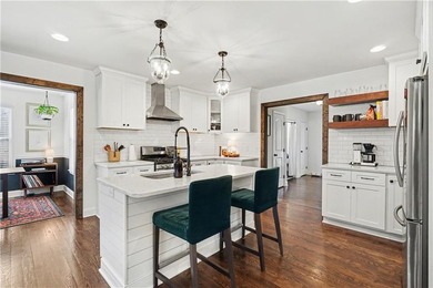Step inside to this open, light-filled floor plan with sleek - photo 3