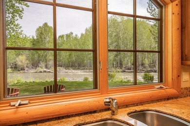 Enjoy the sights and sounds of the Big Wood River from this - photo 12
