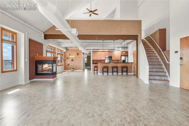 This rare penthouse corner residence in Poet Lofts, offers an - photo 5