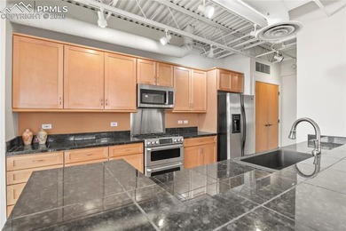 This rare penthouse corner residence in Poet Lofts, offers an - photo 8