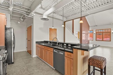 This rare penthouse corner residence in Poet Lofts, offers an - photo 10