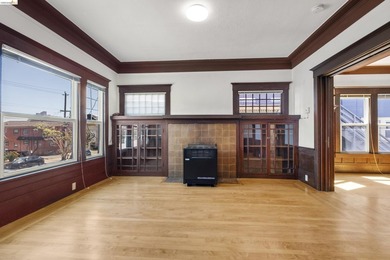 This beautifully preserved 1910 duplex blends timeless character - photo 6