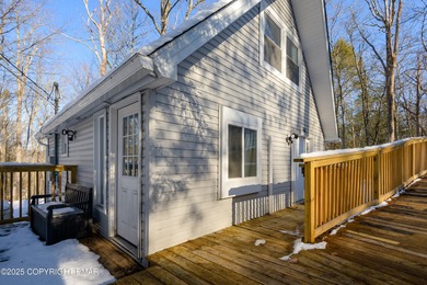 Welcome to this charming chalet style home offering 2 bedrooms