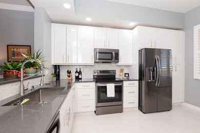 Welcome to this waterfront condominium in Harbour Isle West, on - photo 3