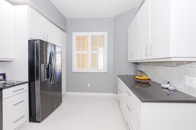 Welcome to this waterfront condominium in Harbour Isle West, on - photo 4