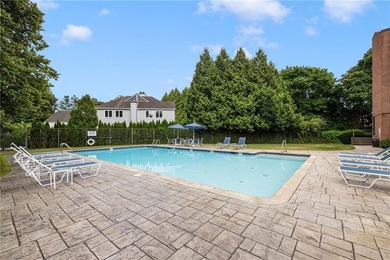 Overlooking the lush greenery and in-ground pool, this private - photo 23