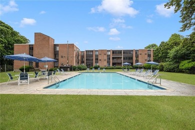 Overlooking the lush greenery and in-ground pool, this private - photo 25