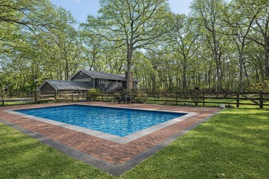Set on 1.92 acres in North Haven, this property offers two - photo 5