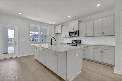 *MOVE IN READY* This spacious townhome boasts a first-floor - photo 8