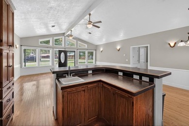 Located on a spacious corner lot, this waterfront 3-bedroom - photo 13