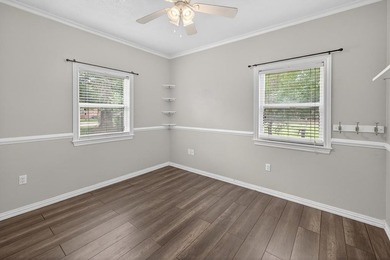 Located on a spacious corner lot, this waterfront 3-bedroom - photo 20