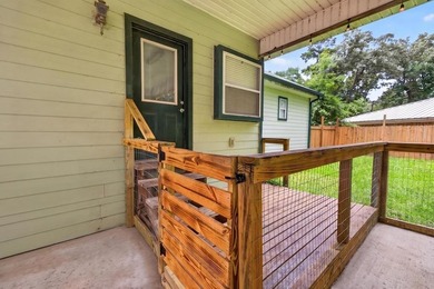 Located on a spacious corner lot, this waterfront 3-bedroom - photo 24