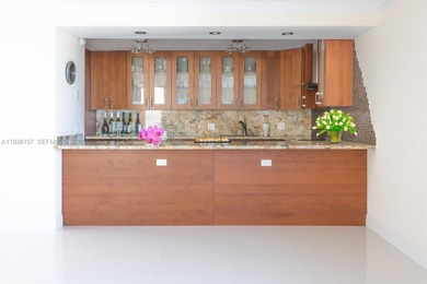 Immerse yourself in refined oceanfront living where every