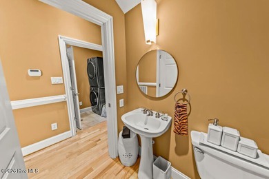 This amazingly luxurious three-bedroom townhome is set for - photo 31