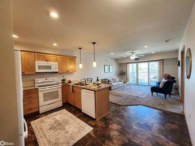 ENJOY THE COMFORT AND CONVENIENCE OF CONDO LIVING IN THIS BRIGHT - photo 2