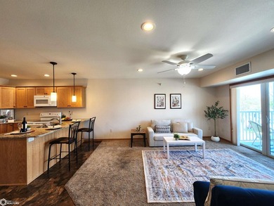 ENJOY THE COMFORT AND CONVENIENCE OF CONDO LIVING IN THIS BRIGHT - photo 4