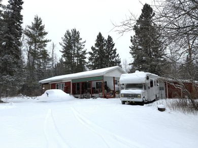 Fletcher Pond Lake Acreage For Sale in Lachine Michigan