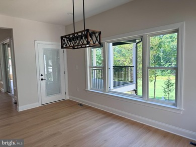 Nestled in the prestigious Lake of the Woods community, this - photo 19