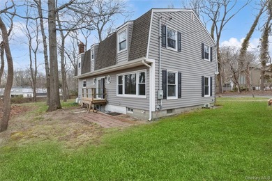 Set on a quiet, tree-lined cul-de-sac in Wading River and - photo 25