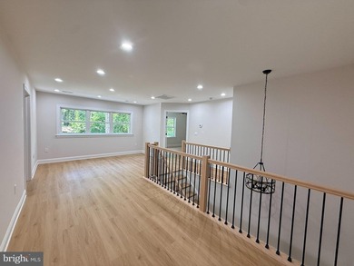 Nestled in the prestigious Lake of the Woods community, this - photo 26