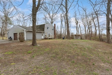 Set on a quiet, tree-lined cul-de-sac in Wading River and - photo 27