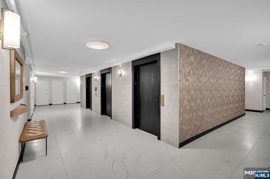 *LUXURY 16TH-FLOOR CONDO* Perched high on the 16th floor of one