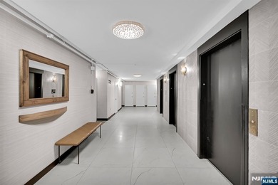 *LUXURY 16TH-FLOOR CONDO* Perched high on the 16th floor of one