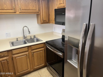 This lovely 2 bedroom condo has its own private patio with