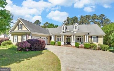 Custom-built lakefront home located within the city limits of - photo 1