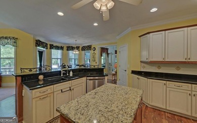 Custom-built lakefront home located within the city limits of - photo 10