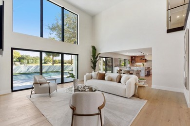 An extraordinary newly renovated estate nestled within the - photo 1