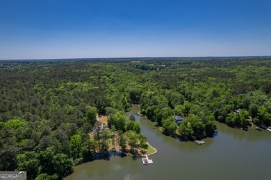 Set along the coveted shoreline of Lake Oconee, this exceptional - photo 6