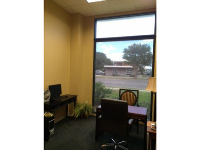 This office suite is on the first floor and features a - photo 9