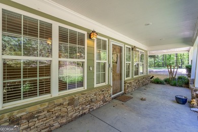 Set along the coveted shoreline of Lake Oconee, this exceptional - photo 10