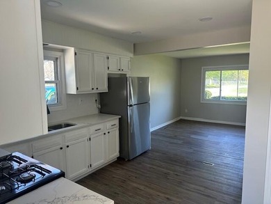 Completely remodeled 4-bedroom, 1.5-bath home located in a - photo 3