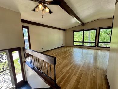 Welcome home to this well-maintained split foyer situated on a - photo 9