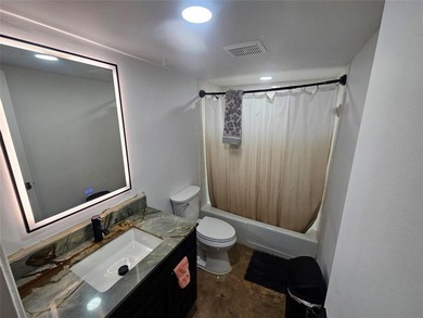 Beautifully remodeled ground-floor Boca Raton condo updated in - photo 5