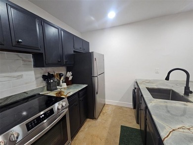 Beautifully remodeled ground-floor Boca Raton condo updated in - photo 9