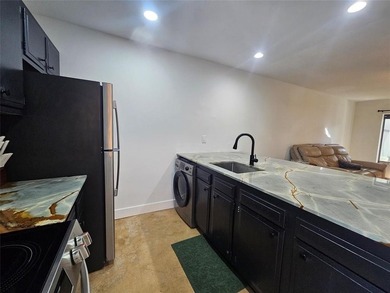 Beautifully remodeled ground-floor Boca Raton condo updated in - photo 10