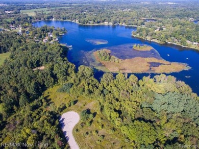 Coon Lake Acreage For Sale in Howell Michigan