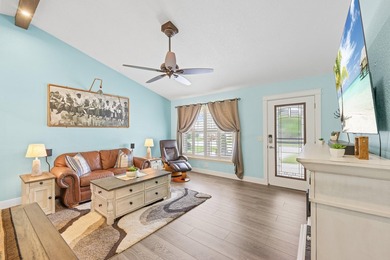 Welcome to 128 Banyan Circle, a meticulously maintained - photo 3