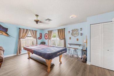 Welcome to 128 Banyan Circle, a meticulously maintained - photo 10