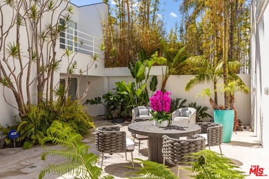 Set against the cinematic backdrop of Malibu's sparkling - photo 4