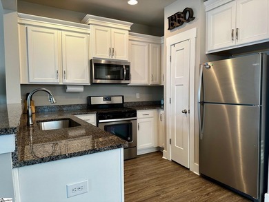 Welcome to 215 Meritage Drive, a beautifully designed townhome - photo 14