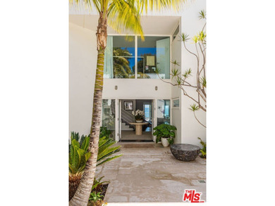 Set against the cinematic backdrop of Malibu's sparkling - photo 5