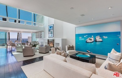 Set against the cinematic backdrop of Malibu's sparkling - photo 9