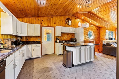 Nestled on the shores of beautiful Upper Narrows Pond, this - photo 11
