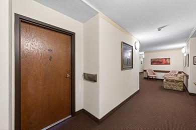 Amazing second floor unit with a private balcony overlooking a - photo 3